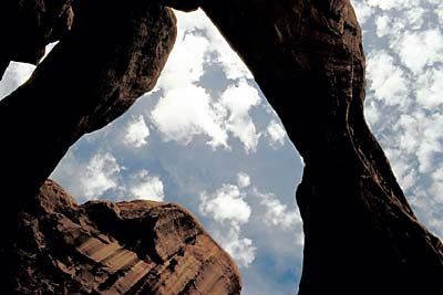 Arches National Park, Moab, UT; The Windows Section Double Arch; underneath, looking up, in silhouette. [ref. to #097.029]