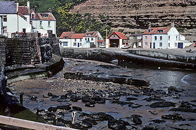 ENG: Yorkshire & Humberside Region, North Yorkshire, North Yorkshire Coast, Sea Cliffs, Straithes, VIew of this fishing village under sea cliffs. [Ask for #133.073.]