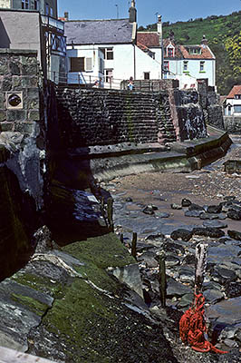 ENG: Yorkshire & Humberside Region, North Yorkshire, North Yorkshire Coast, Sea Cliffs, Straithes, VIew of this fishing village under sea cliffs. [Ask for #133.074.]