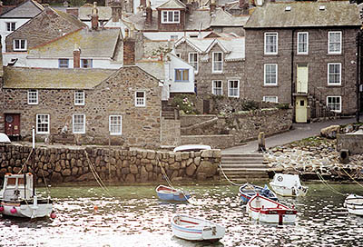 ENG: South West Region, Cornwall, Cornwall AONB, Penwith Peninsula, Mousehole, View of village across harbor in late afternoon sun [Ask for #158.074.]