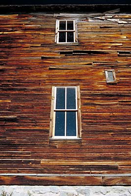 Ghost town of Elkhorn, Mt: Abandoned Fraternal Hall; two windows. Location: MT, Jefferson County, Boulder Valley. [ref. to #170.033]