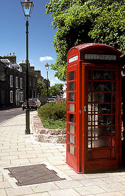 The Black Isle, Cromarty; old red phone box in town center. Location: UK, Scotland, The Highlands, Ross & Cromarty District. [ref. to #176.075]