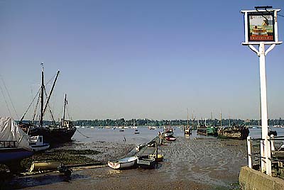 Pub on an historic quay on the Long Reach of the River Orwell; 19th C. wooden river barges await restoration. Location: ENG, Suffolk , Suffolk Coast & Heaths AONB, Southern Estuaries, Chelmondiston. [ref. to #185.076]