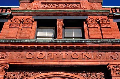 Savannah; Cotton Exchange on Factors Walk. Closeup of relief carving; word "Cotton". Location: GA: Chatham County. [ref. to #195.089]