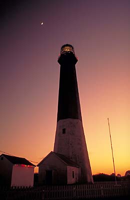 Tybee Island, near Savannah.  Tybee Island Lighthouse at dusk, with  Christmas decorations. Location: GA: Chatham County. [ref. to #196.012]