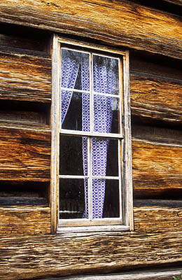 Window in log cabin. Location: NC, Swain County, Great Smoky Mountains Nat. Park, Newfound Gap Road, Pioneer Farm Museum at Oconaluftee Ranger Station. [ref. to #196.055]