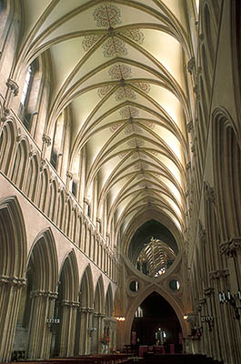 ENG: Somerset , The Mendip Hills, Wells, Wells Cathedral, View up the nave, showing the frescoes on the ceiling and the ribbed barrel vaulting [Ask for #201.044.]