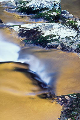 Gold reflections on water; rapids closeup. Location: NC, Swain County, Great Smoky Mountains Nat. Park, Deep Creek Area. [ref. to #207.048]