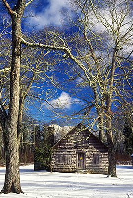 Wilson Lick Ranger Station, c. 1911 Shingle-walled residence, in snow. Location: NC, Macon County, Nantahala National Forest, The Northern Nantahala Mountains, Wayah Bald Area. [ref. to #207.079]