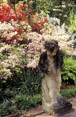 Charleston; Nathanial Russell House. Statue of a child; azaleas in bloom. Location: SC: Charleston County. [ref. to #211.120]