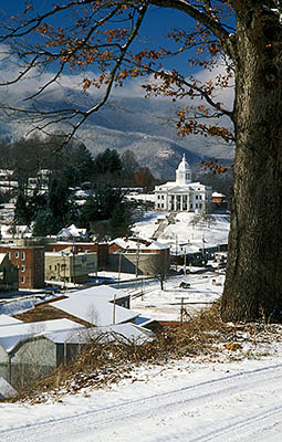 Old Jackson County Courthouse from a gravel road; in snow. Location: NC, Jackson County, Balsam Mountains, Sylva. [ref. to #223.117]