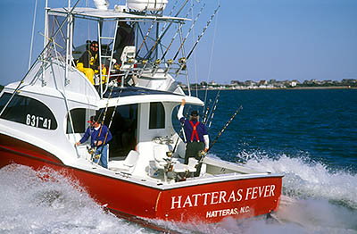 NC: Hyde County, Hatteras National Seashore, Ocracoke Island, Hatteras-Ocracoke Ferry on Pamlico Sound, The Outer Banks; Sports fishing boat "Hatteras Fever" under way on Pamlico Sound NOT RELEASED [Ask for #224.450.]