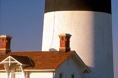 Lower section w. service bldg. roofline. Location: NC, Dare County, The Outer Banks, Hatteras National Seashore, Bodie Island Lighthouse. [ref. to #224.456]