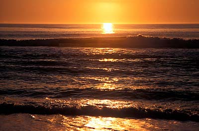 Sun rising over Atlantic Ocean. Location: NC, Dare County, The Outer Banks, Hatteras Island, Rodanthe. [ref. to #224.468]