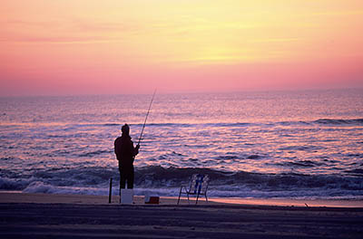 Surf fishing at sunrise. Location: NC, Dare County, The Outer Banks, Hatteras Island, Rodanthe. [ref. to #224.523]