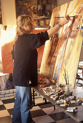 Painter Carol Bomer at work in her studio. Location: NC, Buncombe County, Asheville Area, Arden. [ref. to #228.324]