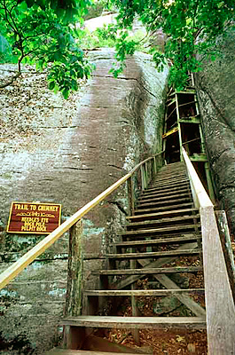 Wooden stairs spiral up the Needle's Eye. Location: NC, Rutherford County, The Blue Ridge Mountains, Hickory Nut Gorge, Chimney Rock Park. [ref. to #232.419]