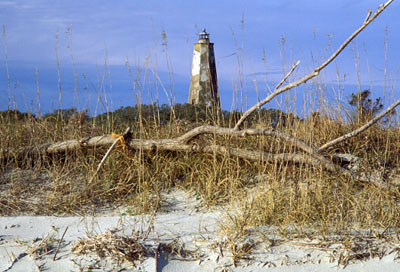 Viewed from West Beach, across dunes. Location: NC, Brunswick County, Cape Fear Area, Bald Head Island, Bald Head I. Lighthouse (Old Baldy). [ref. to #233.059]