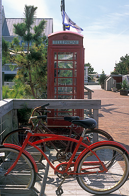 Bald Head Island's ferry terminal area; bicycle stand by English phone box. Location: NC, Brunswick County, Cape Fear Area, Bald Head Island, Harbour Village. [ref. to #233.079]