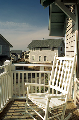 Upstairs porch with rocking chair, on #23 Skye Crescent. Location: NC, Brunswick County, Cape Fear Area, Bald Head Island, Flora's Bluff. [ref. to #233.112]