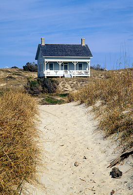 Capt. Charlie's Station, viewed from the beach path as it crosses the dune line. Location: NC, Brunswick County, Cape Fear Area, Bald Head Island, Captain Charlie's Station. [ref. to #233.131]