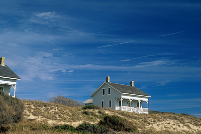 Viewed from the beach dunes to the front (south) of the cabins. Location: NC, Brunswick County, Cape Fear Area, Bald Head Island, Captain Charlie's Station. [ref. to #233.134]