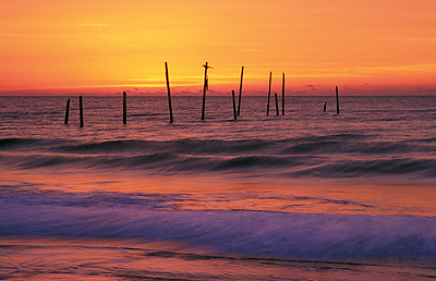 Sunrise from the beach; view towards Johnnie Mercer Fishing Pier. Location: NC, New Hanover County, Wilimington Area, Wrightsville Beach. [ref. to #233.231]