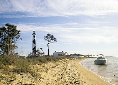 Lighthouse viewed from ferry landing. Location: NC, Carteret County, Cape Lookout Nat. Seashore, Cape Lookout, Cape Lookout Lighthouse. [ref. to #233.465]