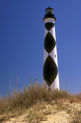 Lighthouse viewed from west over sound-side dunes. Location: NC, Carteret County, Cape Lookout Nat. Seashore, Cape Lookout, Cape Lookout Lighthouse. [ref. to #233.474]