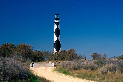 Lighthouse, viewed from wooden bridge. Location: NC, Carteret County, Cape Lookout Nat. Seashore, Cape Lookout, Cape Lookout Lighthouse. [ref. to #233.489]