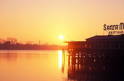 St Augustine Harbor on the Matanzas River, from the Historic District; sunrise, Santa Maria Restaurant rt, on stilts. Location: FL, St. Johns County, St. Augustine, Municipal Yacht Pier. [ref. to #234.005]