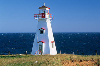 PE: Queens County, Anne's Land Area, Cape Tryon, Cape Tryon Lighthouse. In autumn meadows on a cliff top, with the Gulf of St. Lawrence in bkgd. [Ask for #240.159.]