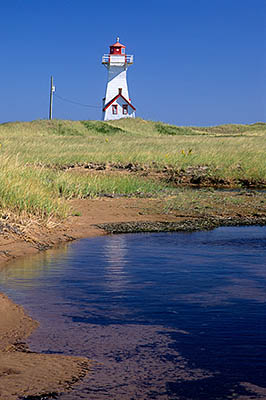 Prince Edward Island, Canada. New London Bay Lighthouse. General view in grass-covered sand dunes, by tidal inlet. Location: PE, Queens County, Anne's Land Area, New London Bay. [ref. to #240.186]