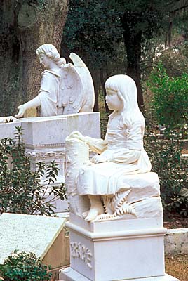 Victorian funary sculpture of a little girl, on the Gracie Watkins grave. Location: GA, Chatham County, City of Savannah, Bonaventure Cematary. [ref. to #241.129]