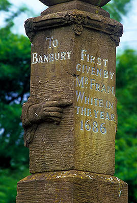 ENG: Thames & Chilterns Region, Oxfordshire, Upper Cherwell Valley, Banbury, Wroxton, Carved stone signpost, 17th C., with directions indicated with pointing fingers. Detail, showing finger "To Banbury" [Ask for #243.079.]