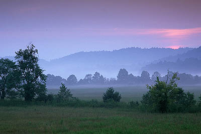 TN: The Great Smoky Mtns Region, Blount County, Great Smoky Mountains Nat. Park, Cades Cove, Cades Cove Loop Road, Twilight settles over the cove [Ask for #245.004.]