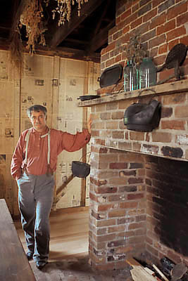 Museum Director Jim Priesmeyer in period garb, in one of the museum's rooms. Location: NC, Yancey County, Mayland Valley, Burnsville, The McElroy House (Yancey Hist Mus). [ref. to #245.132]