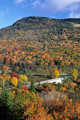 Autumn view from Flat Rock towards Grandfather Mountain, showing the Blue Ridge Parkway. Location: NC, Avery County, The Blue Ridge Parkway, Flat Rock Overlook, MP 308. [ref. to #245.268]