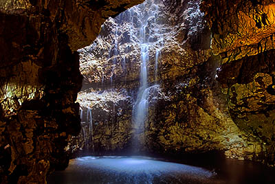 Waterfall inside Smoo Cave, formed as stream flows into cave through a hole in roof. Location: SCO, Sutherland District, Northern Coast, Durness, Smoo Cave. [ref. to #246.857]