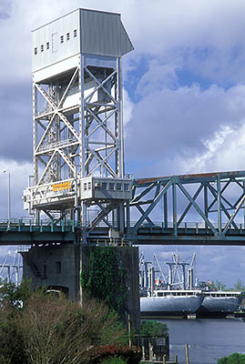 NC: New Hanover County, Cape Fear River Area, Wilmington, Wilmington Seaport, Riverside Park; Cape Fear Memorial Bridge (US 17) crosses the Cape Fear River [Ask for #249.361.]