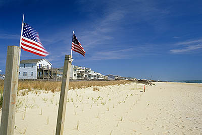 NC: New Hanover County, Wilimington Area, Carolina Beach Area, Kure Beach, Beach view; flags [Ask for #249.448.]