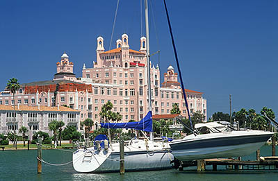 St. Petersburg Beach. The Don Cesar Hotel viewed over Boca Ciega Bay, with small yatchs moored in the foreground. Location: FL, Pinellas County, St. Petersburg. [ref. to #250.006]