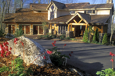 Front view, with early spring flowers. Location: NC, Yancey County, Burnsville Area, Mountain Air (gated community), Home designed by Armin Wessel, Arch.. [ref. to #252.107]