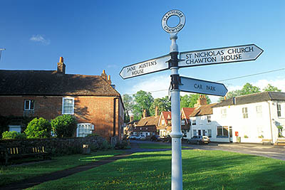 Cast iron road sign in front of house. Location: ENG, Hampshire , South Downs National Park, The South Hampshire Downs, Jane Austin's House. [ref. to #253.001]