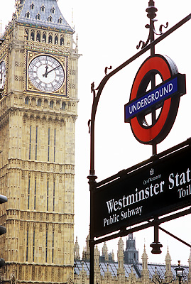 Rainy day view of Big Ben, with Westminster Underground sign in foreground. Location: ENG, Greater London , City of Westminster, St James District, House of Parliament. [ref. to #256.108]