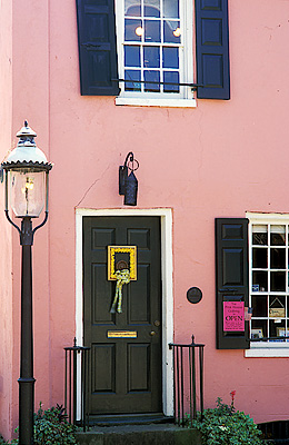 Gas light burns in front of an historic residence, now a shop. Location: SC, Charleston County, Charleston Area, City of Charleston, Downtown Historic District. [ref. to #258.004]