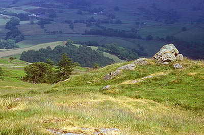 View from the top of Reston Scar over the valley below; a storm cloud is putting the valley into shadow. Location: ENG, Cumbria , Lakes District N.P., Windermere Area, Staveley. [ref. to #259.213]