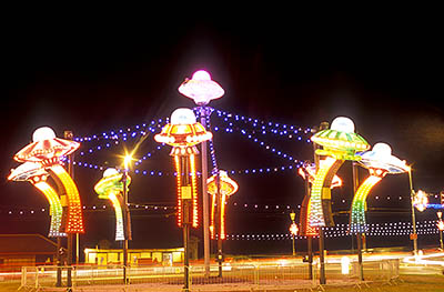 ENG: Manchester-Liverpool Urban Area, Blackpool Borough, North Shore, A roundabout on The Promenade decorated with flying saucers for the Illuminations Festival, lighted at night [Ask for #262.071.]