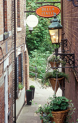 ENG: Northumbria Region, Durham, Durham Borough, Medieval Durham, A "vennel", or alleyway, leads downhill in steps to an Italian restaurant, then to the park along the River Wear [Ask for #262.355.]