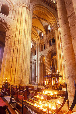 ENG: Northumbria Region, Durham, Durham Borough, Medieval Durham, Durham Cathedral. Interior; Prayer candles in the Nave, with view towards the North Transcept [Ask for #262.373.]